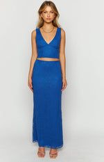 Royal blue lace maxi skirt with a straight, form-fitting silhouette and delicate floral lace overlay