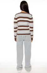 Rear view of the brown, white, and light blue striped knit cardigan with a simple crew neck and ribbed hem