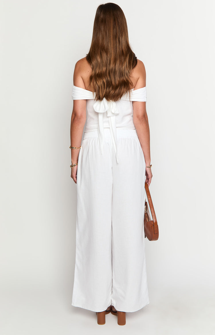 Rear view of white linen blend wide-leg pants with an elasticated waist
