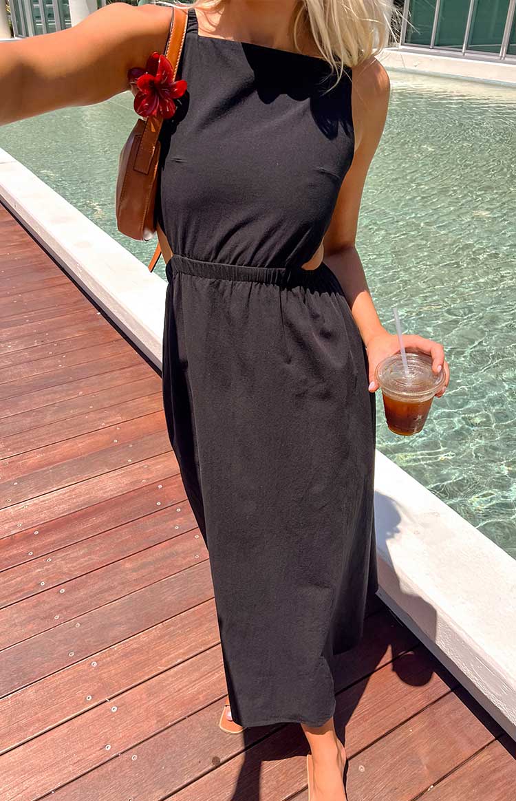 Black midi dress with square neckline, side cutouts, and elasticated waist