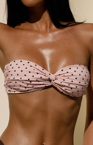 Beginning Boutique Noosa Pink Polka Dot Strapless Twist Bikini Top — pink strapless bandeau bikini top with black polka dots and twist front detail