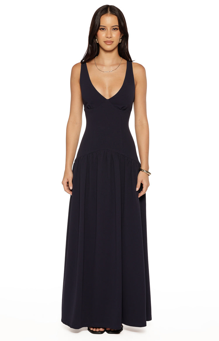 Navy crepe maxi dress with a deep V-neckline, fitted bodice, and gathered drop waist