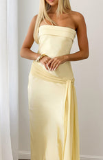 Yellow satin strapless maxi dress with a folded band neckline, ruched waist, and side tie detail