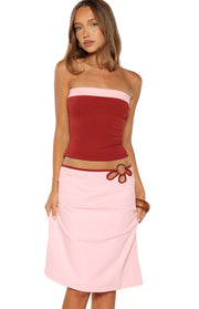 Red strapless top with a light pink contrast band at the neckline, fitted and cropped