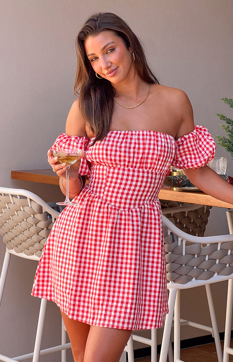 Beginning Boutique Love Lost Off The Shoulder Red Gingham Mini Dress with shirred bust, puff sleeves, and fitted waist