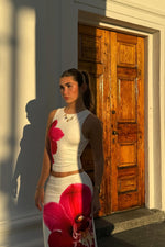 Beginning Boutique Payge White Orchid Maxi Skirt white fitted maxi skirt with a large red orchid print