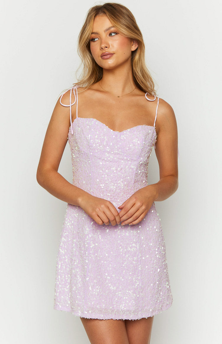 Front view of a purple sequin mini dress with a sweetheart neckline and delicate tie-up spaghetti straps