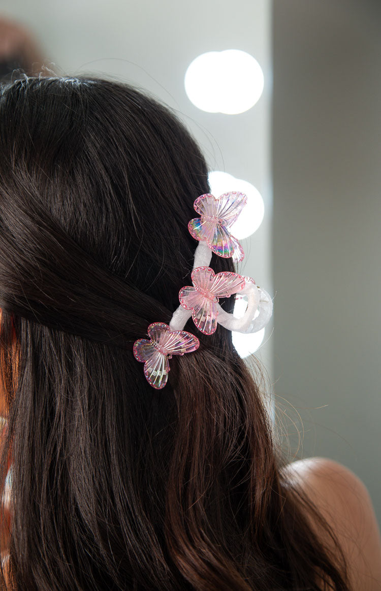 Beginning Boutique Pink Iridescent Butterfly Claw Clip a pink iridescent butterfly shaped claw clip with ribbed wings