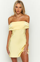 Yellow satin strapless mini party dress with adjustable back tie on brunette model.
