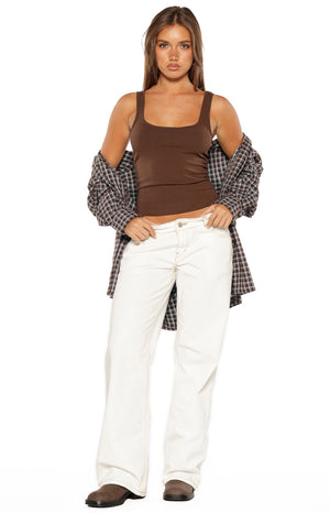 Full length view of the brown scoop neck tank top, showing its fitted silhouette and cropped hem