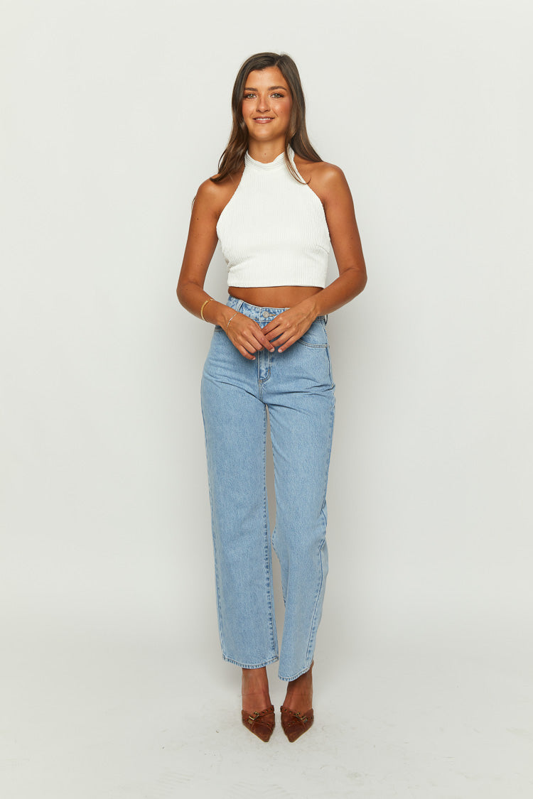 White ribbed halter neck crop top with a high neckline and fitted silhouette