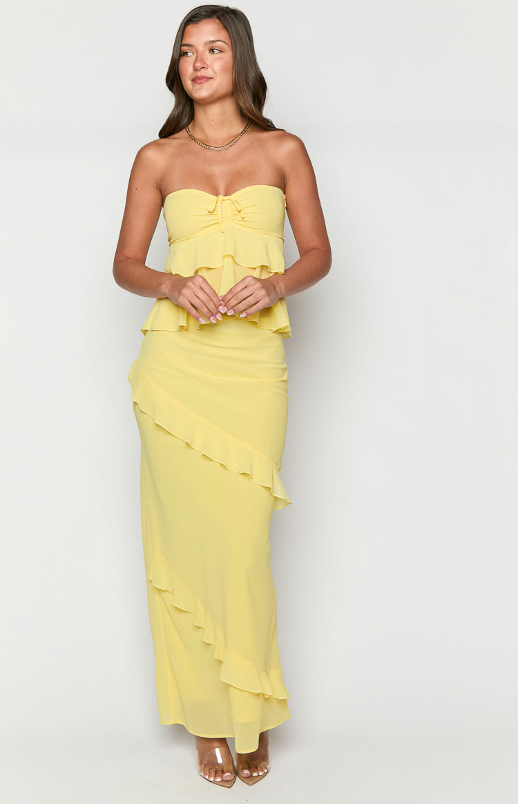 Yellow maxi skirt with diagonal ruffles and a long flowy silhouette