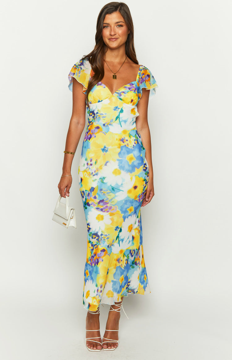 Blue and yellow floral chiffon maxi dress with a fitted bodice, sweetheart neckline, and flutter sleeves
