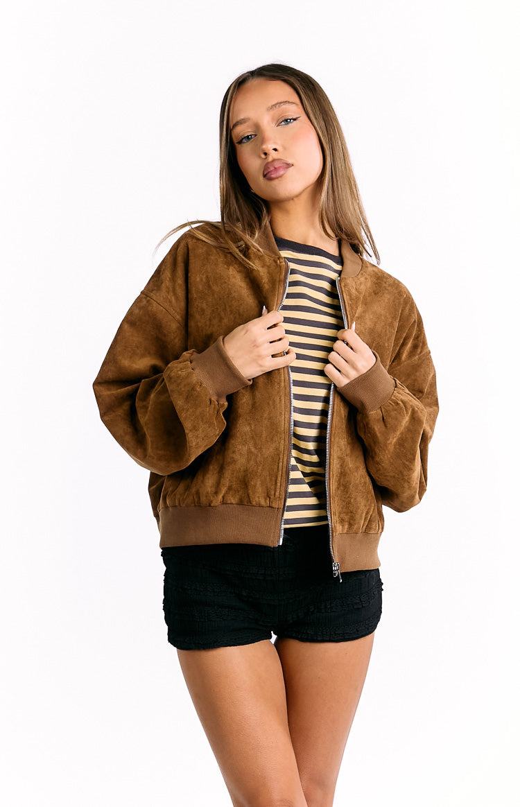 Tan suedette bomber jacket with ribbed cuffs and hem, worn slightly open