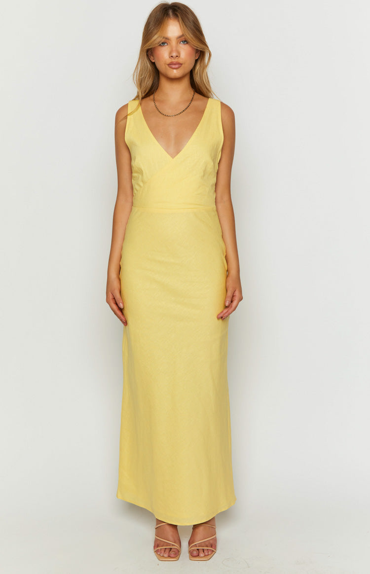 Yellow linen blend maxi dress with a V-neckline, sleeveless design, and a subtle textured finish