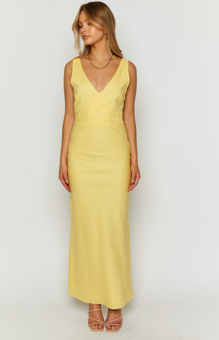 Front view of a yellow linen blend maxi dress with a V-neckline and fitted bodice