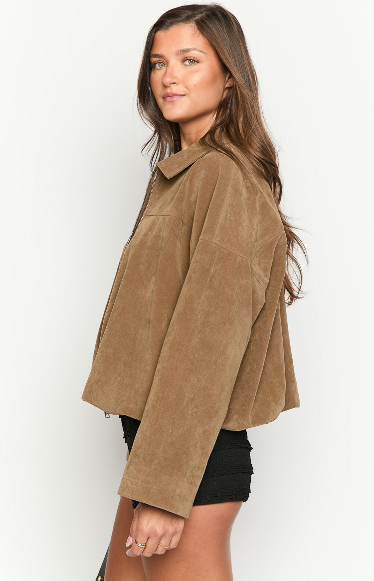 Side view of a brown suedette bomber jacket with a collared neckline, front zipper, and loose fit