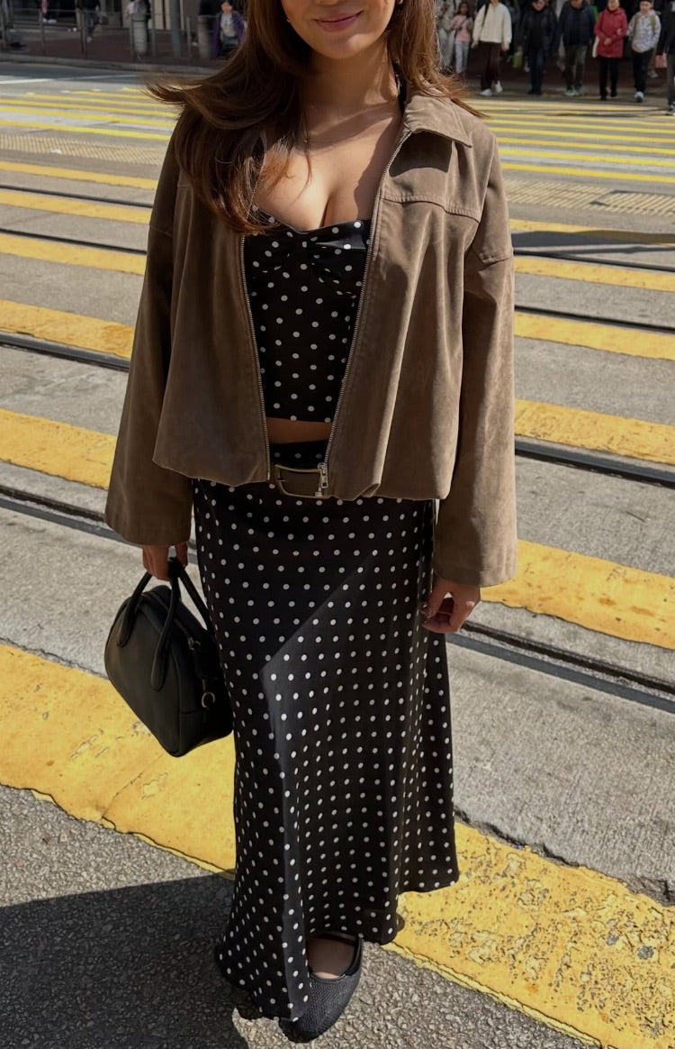 Front view of a brown suedette bomber jacket worn open, showing the silver zipper and pointed collar