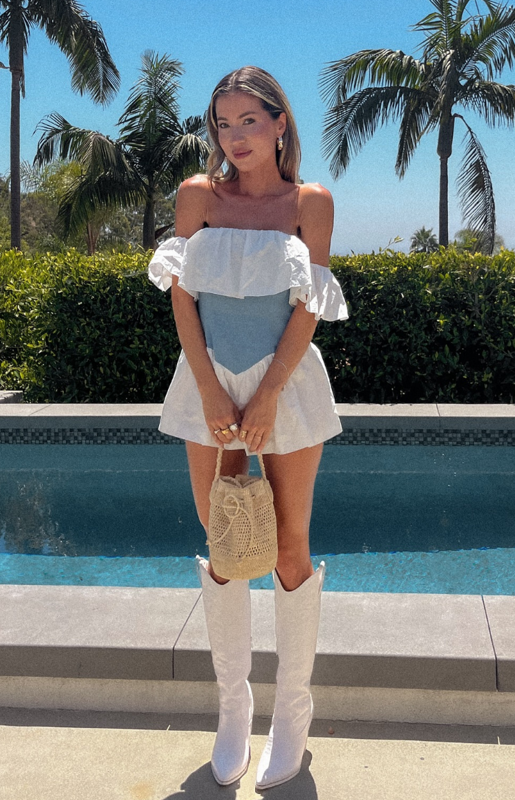 Beginning Boutique Romi Denim Playsuit light blue denim and white off-shoulder ruffled playsuit with V-seam