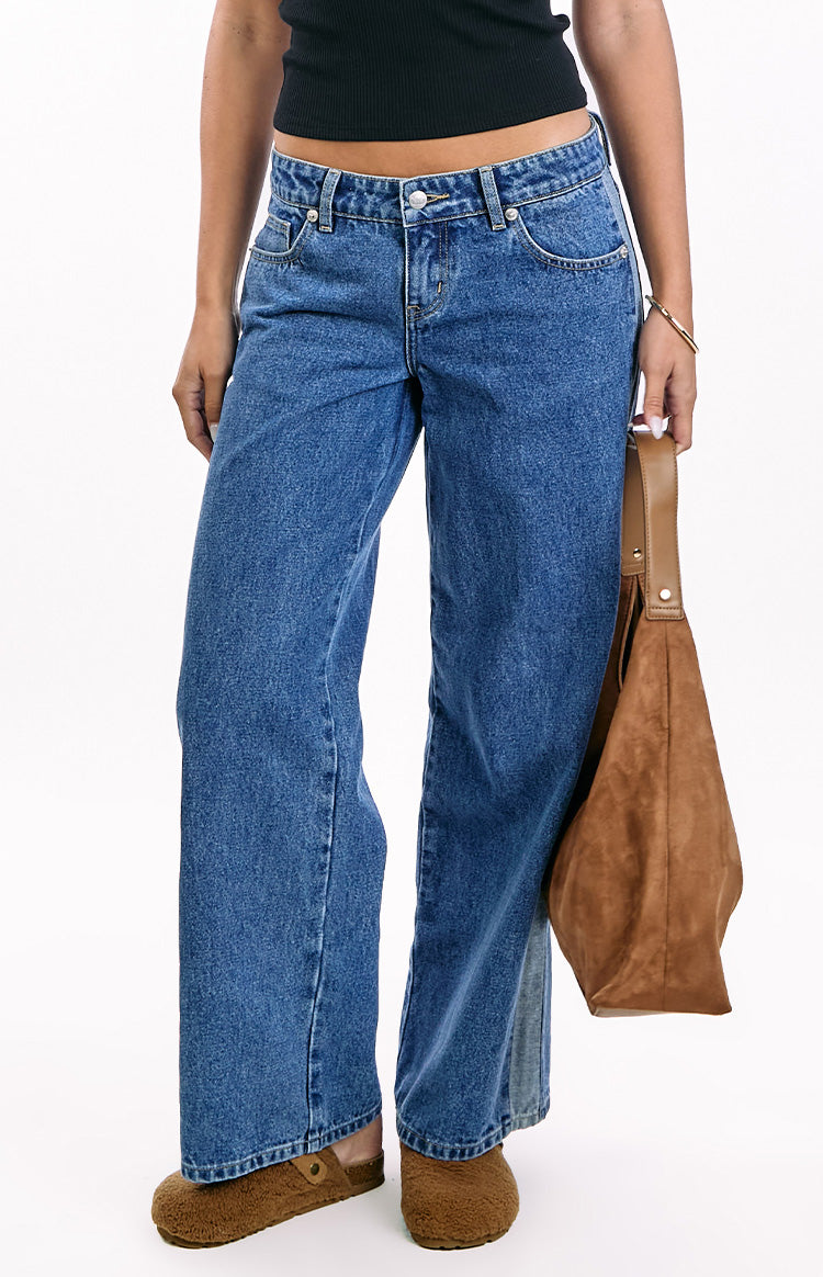 Beginning Boutique Roonie Contrast Stripe Mid Wash Denim Low Rise Jeans mid wash blue denim low rise jeans with a contrast stripe on the side and a relaxed straight leg