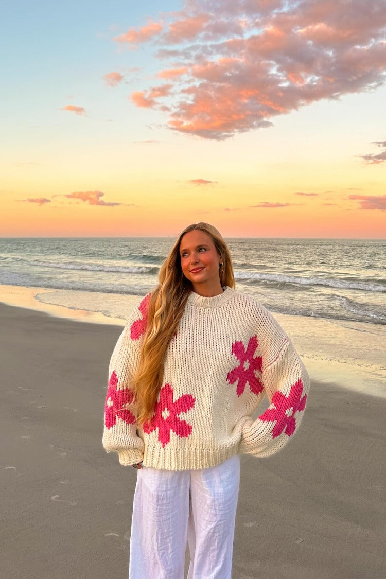 Beginning Boutique Ryver Cream Flower Knit Sweater cream knit oversized sweater with hot pink flower motifs and a crew neck