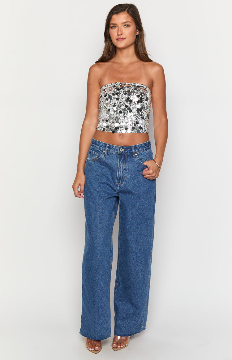Mid wash denim wide leg boyfriend jeans with a high waist and full length