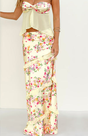 Beginning Boutique Saldana Yellow Bloom Maxi Skirt yellow floral satin maxi skirt with ruffled tiers
