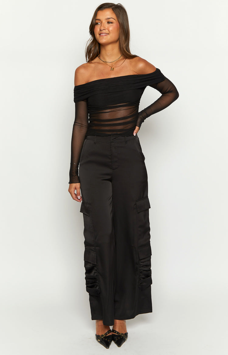 Black satin wide-leg cargo pants with side pockets and ruched lower leg detail