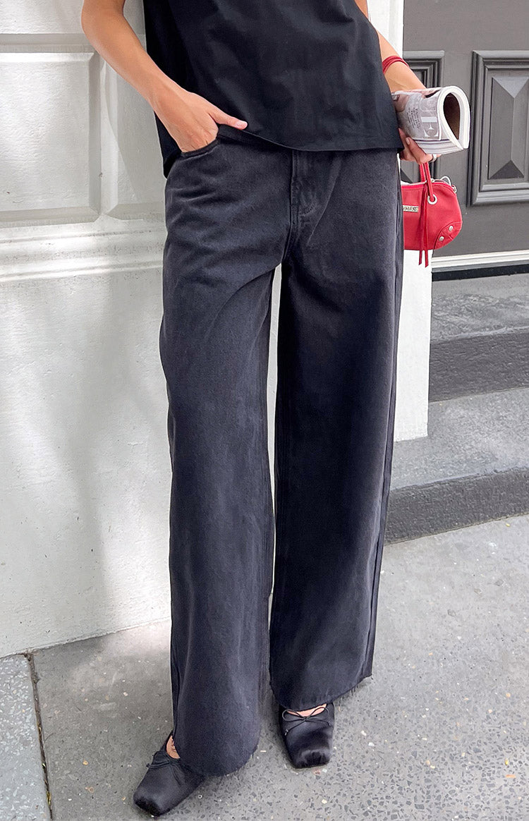 Relaxed fit faded black wide leg boyfriend jeans with a slightly distressed wash