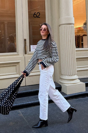 Beginning Boutique So Breezy Navy Stripe Long Sleeve Top navy and white striped relaxed fit crew neck long sleeve top with ri