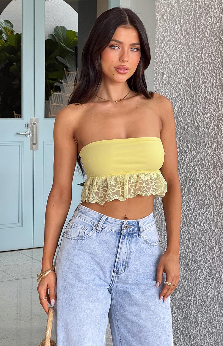 Beginning Boutique Sparrow Yellow Lace Frill Strapless Crop Top yellow bandeau crop top with a floral lace frill hem
