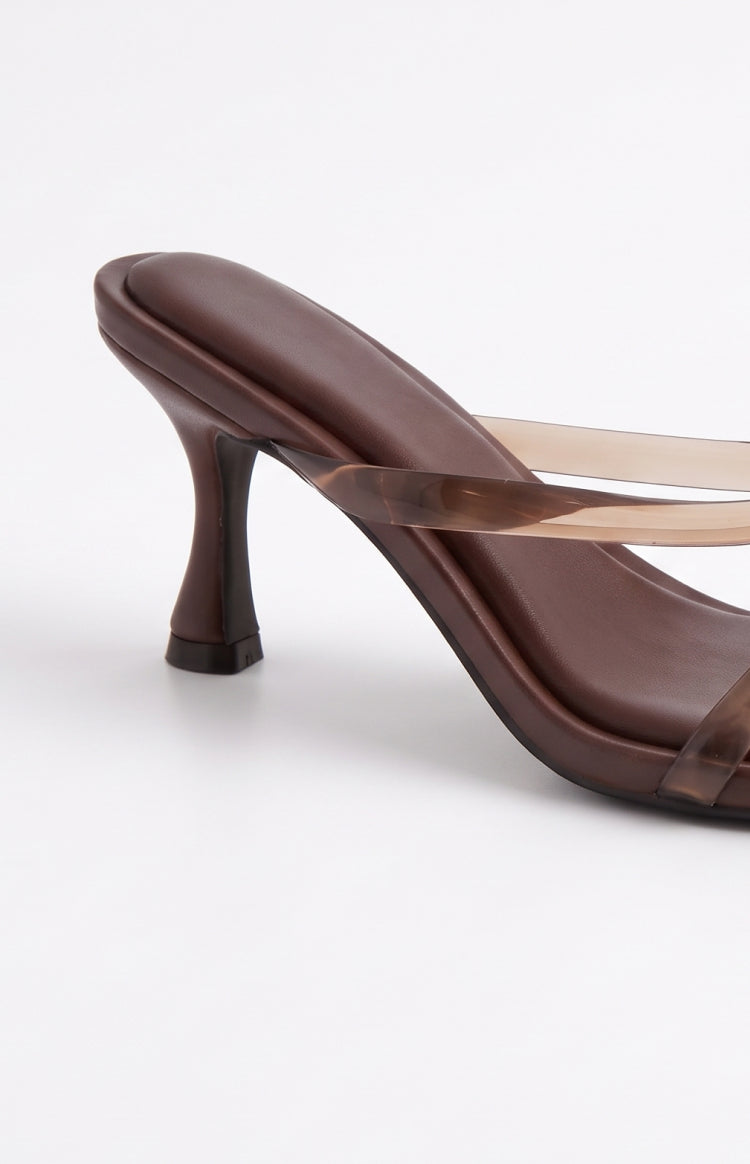 Close-up of the chocolate brown kitten heel and translucent jelly straps of the thong heels