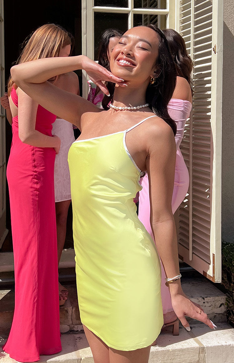 Beginning Boutique Sunny Chic Yellow Satin Mini Dress yellow satin cowl neck mini dress with white spaghetti straps