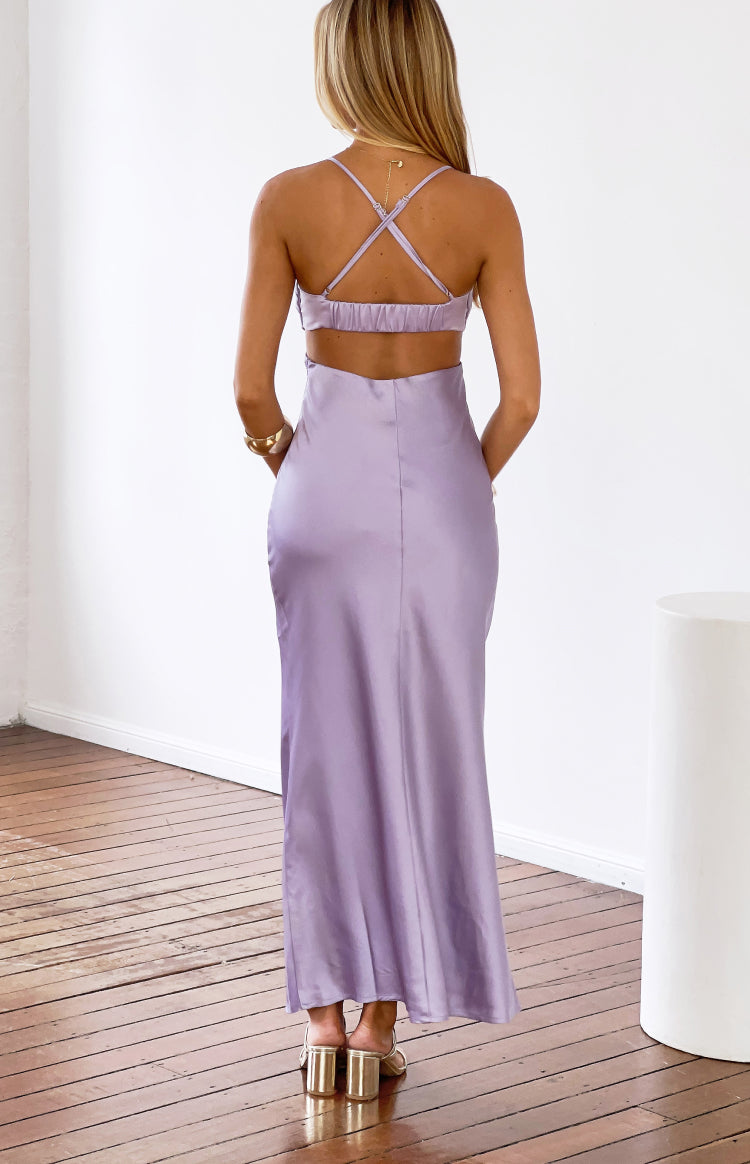 Rear view of a lilac satin maxi dress with criss-cross spaghetti straps, shirred back band, and large back cutout
