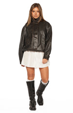 White mini dress with a simple, slightly flared hemline and relaxed fit