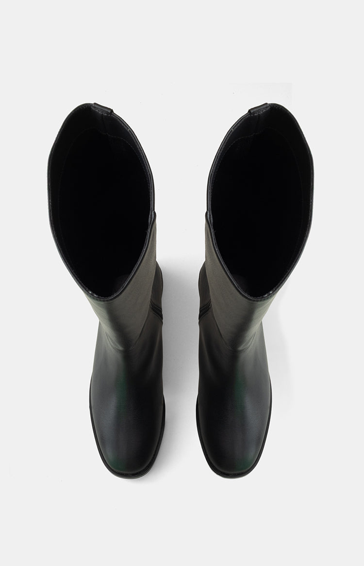 Overhead view of the black PU riding boots showing the wide shaft opening and rounded toe shape