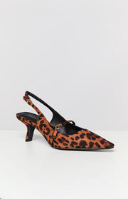 Side view of a leopard print kitten heel with a pointed toe, slingback strap, and Mary Jane style strap