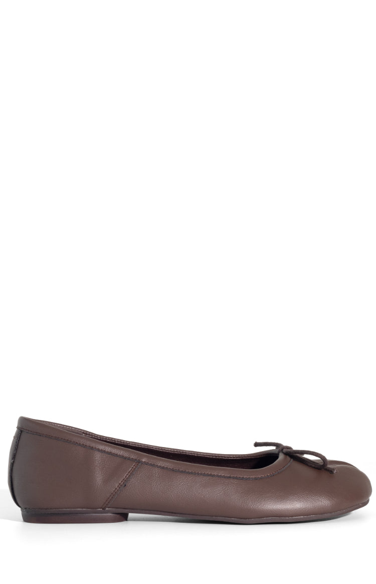 Side view of a chocolate brown ballet flat with a small bow detail on the toe and a low heel