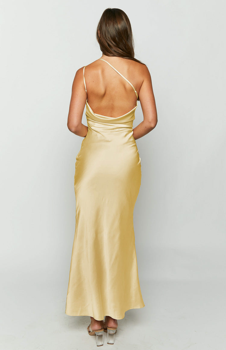 Rear view of a yellow satin maxi dress with a low draped cowl back and thin spaghetti straps