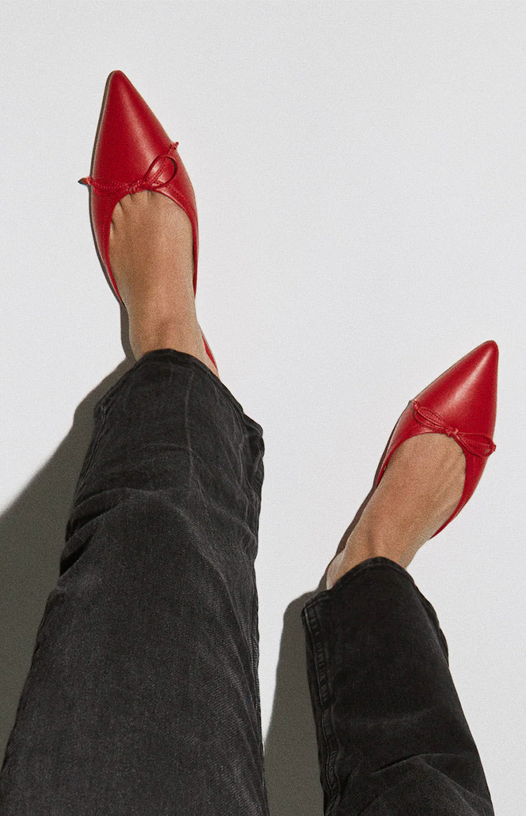 Beginning Boutique Tony Bianco Javelin Ruby Mule Flats ruby red pointed-toe mule flats with a small bow detail