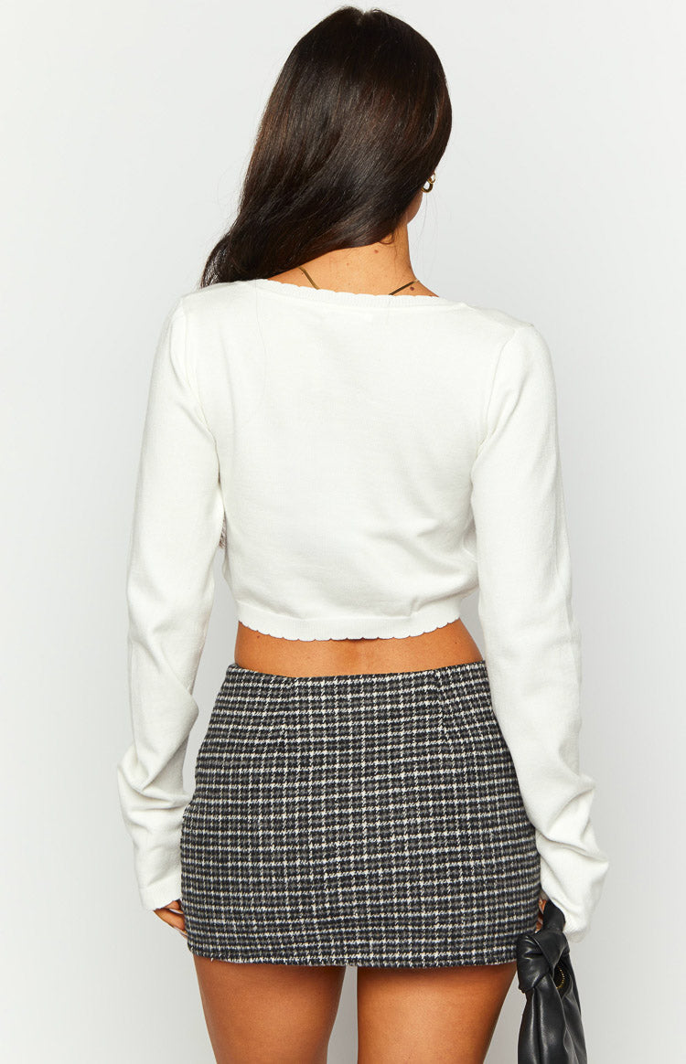 Rear view of a twilight grey plaid mini skirt with a small check pattern