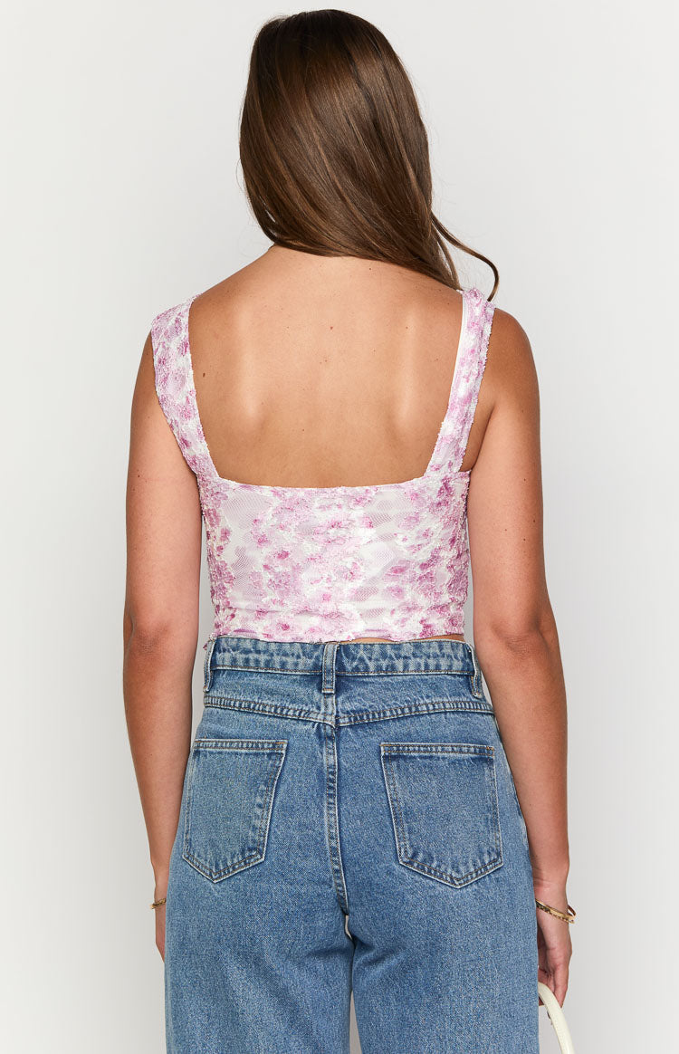 Rear view of the pink and white lace crop top with a square back neckline and wide shoulder straps