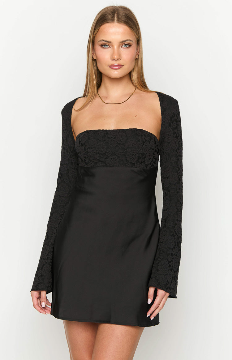 Black mini dress with a square neckline, floral lace bust, and long lace sleeves with an open shoulder design