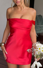 Close-up of the red satin off-the-shoulder mini dress with a draped and ruched bustline