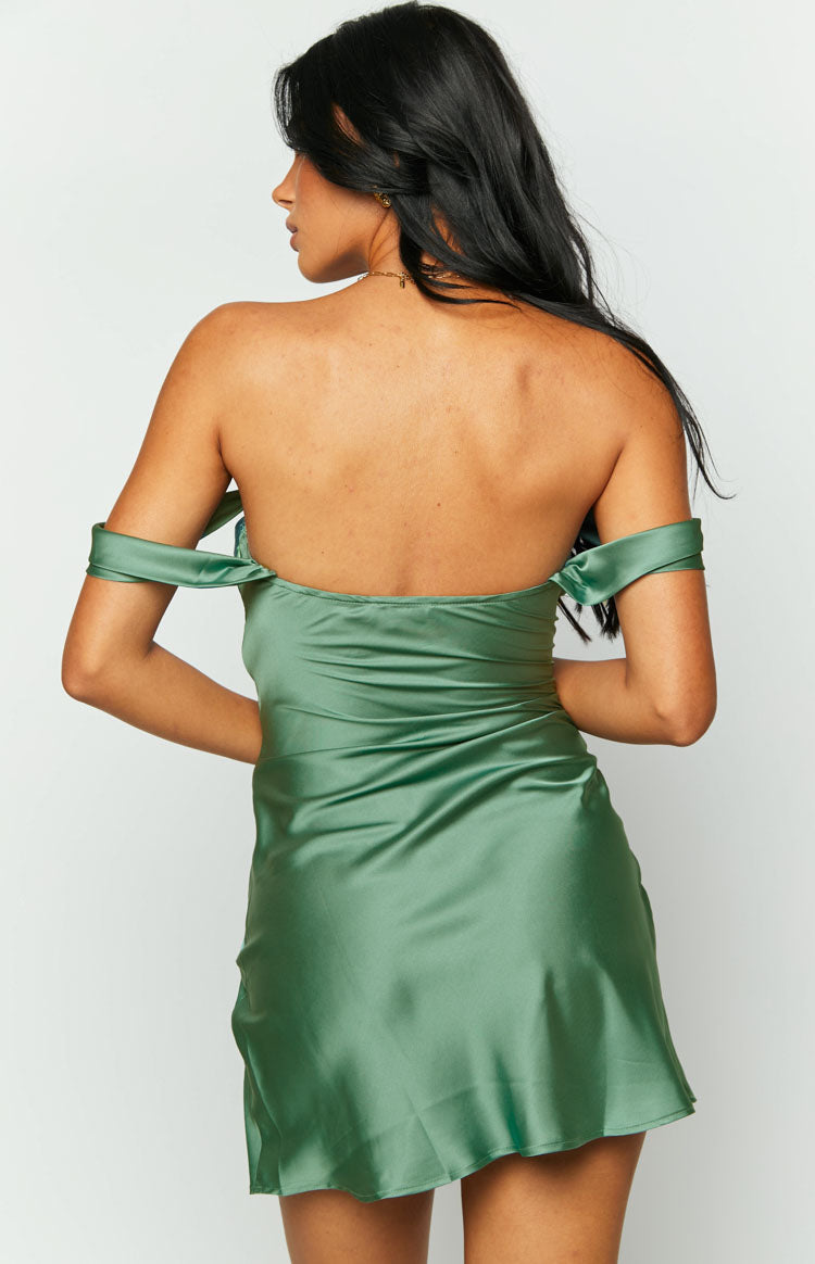 Rear view of a green satin off-shoulder mini dress with a straight back and draped shoulder bands