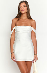 White off-the-shoulder mini dress with a draped bodice and fitted silhouette