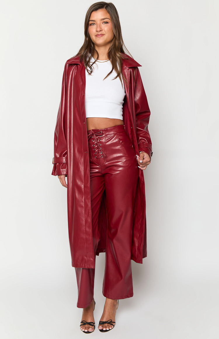 Front view of red PU wide-leg pants with a lace-up corset-style waist detail