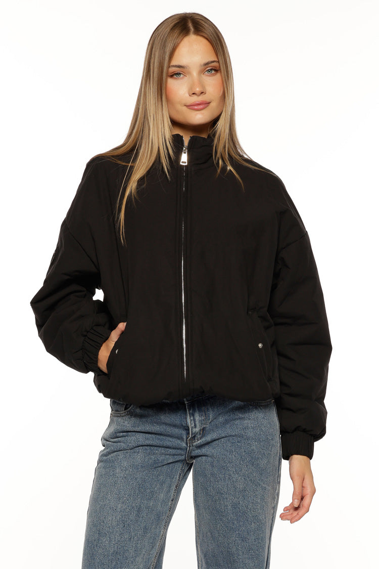 Beginning Boutique Ace Black Oversized Puffer Jacket black oversized puffer jacket with a high neck, zip front, and elasticated cuffs