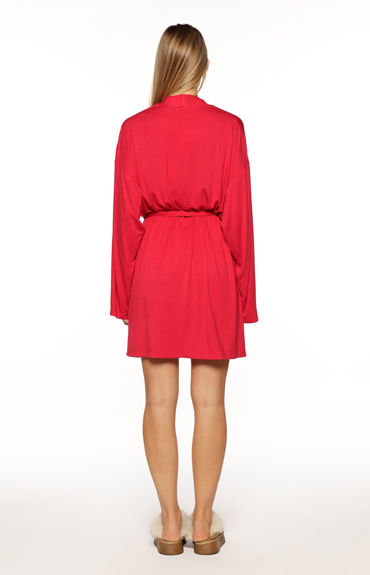 Rear view of a red mini robe with long sleeves and a cinched waist
