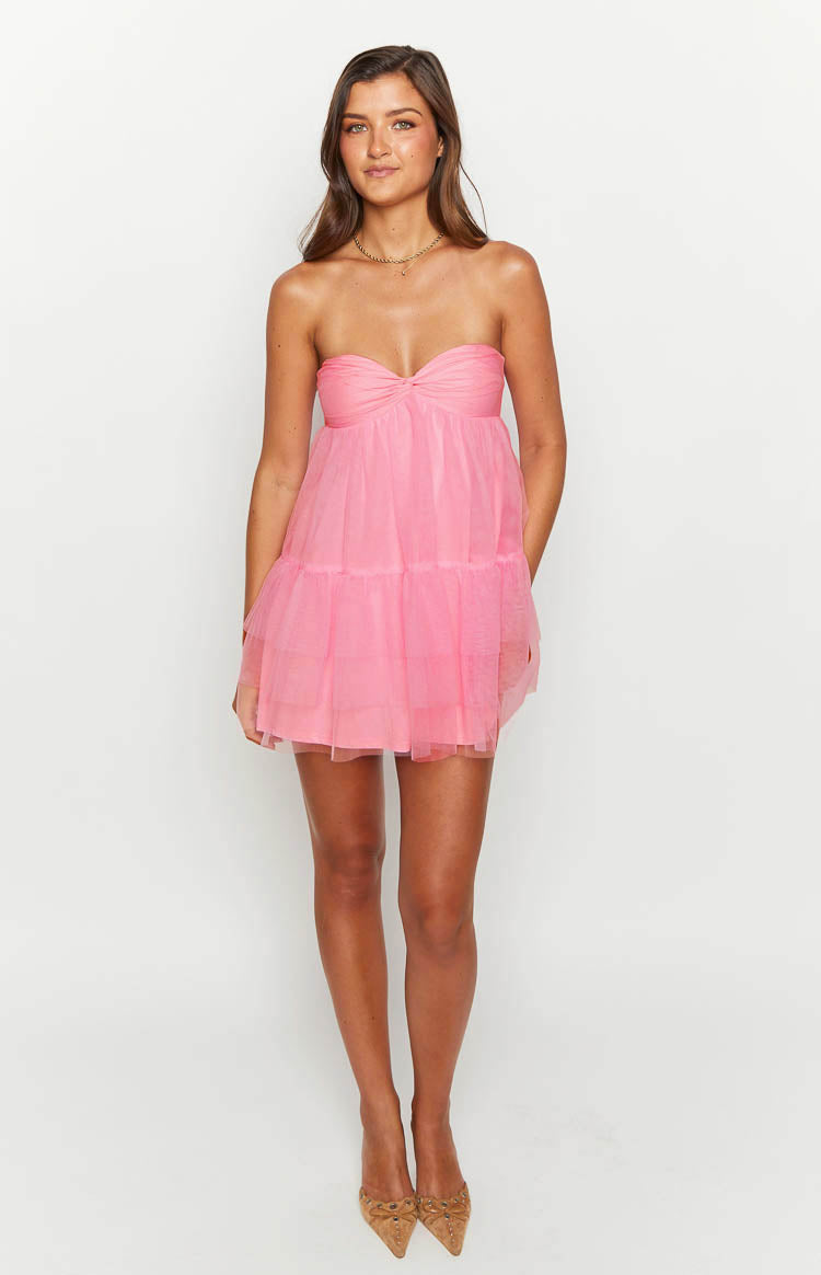 Pink strapless mini dress with a ruched sweetheart neckline and tiered tulle skirt